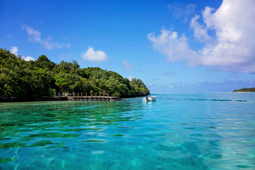 Obraz premium Beautiful amazing nature background. Tropical blue sun sea. Luxury holiday resort. Island atoll about coral reef. Fresh freedom. Adventure day