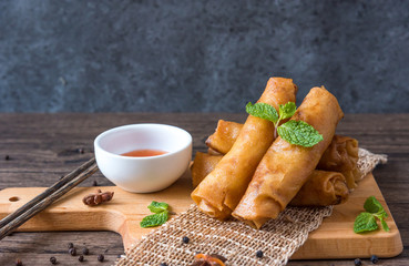 deep fried spring rolls, Por Pieer Tod or Fried spring rolls (Thai Spring Roll) Snacks and snacks that are popular with Thai and Chinese people. - Powered by Adobe