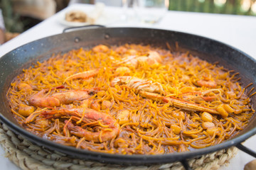 Fideua noodles of seafood in paella Denia Alicante Spain