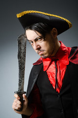 Man pirate against dark background