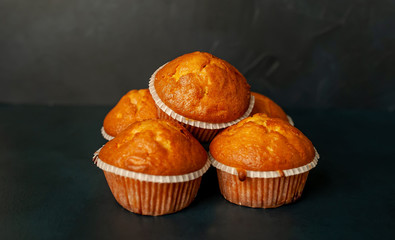 muffins with filling, on a background of dark concrete