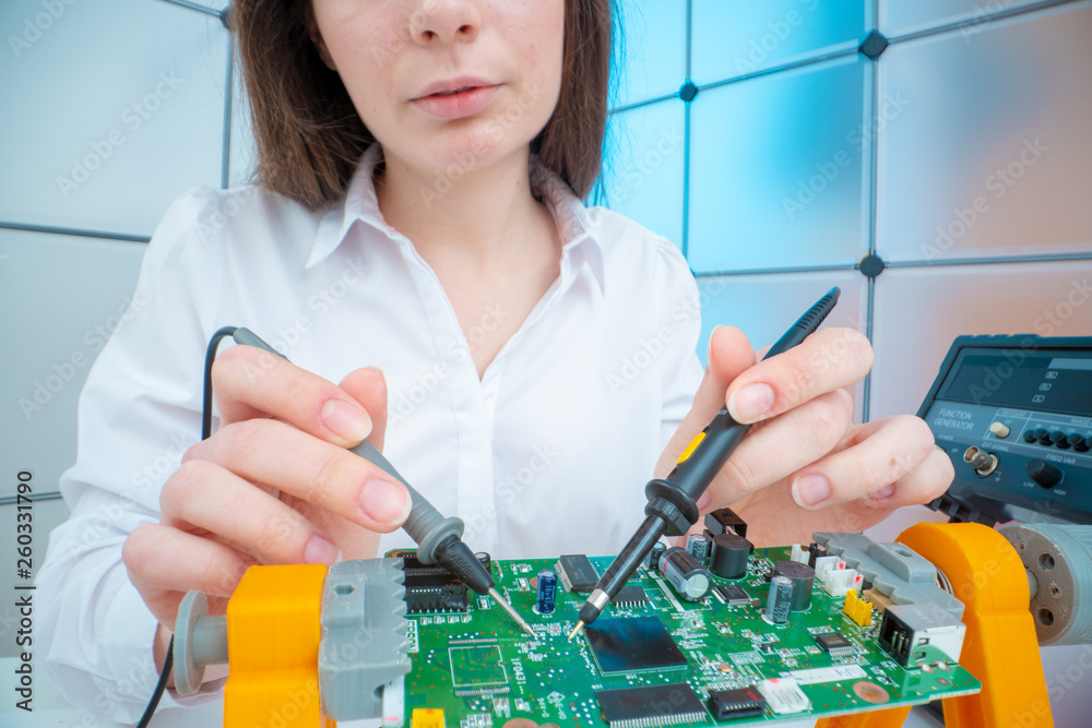 Sticker girl with measuring devices in the electronics laboratory