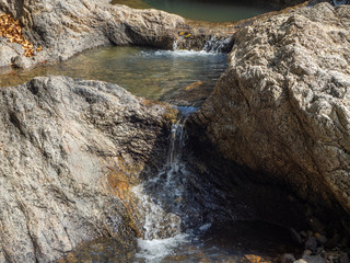 Water bath formed by the waterfall on Koh Phangan. Thailand