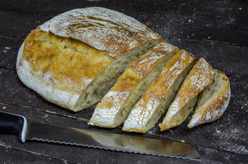 Freshly baked homemade bread on a wooden table