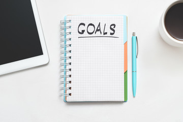 Career aspiration and goals. Scheduling future achievements. Think creative. Talent and knowledge. Notepad, tablet, coffee