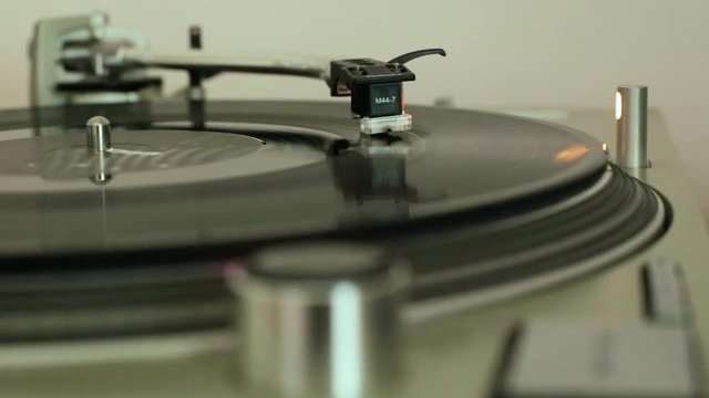dj vinyl record in the player