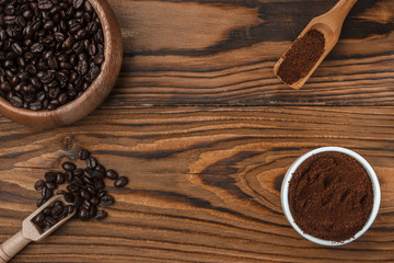 Roasted coffee beans and ground in wood spoons, cinnamon