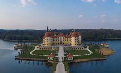Fototapeta premium Photo showing Moritzburg Castle in Saxony, Germany. Photo taken from a drone at the Golden Hour.