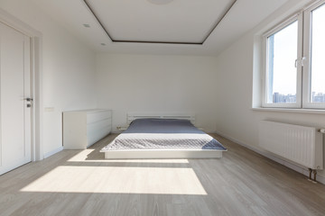 A 3D rendering of white bedroom