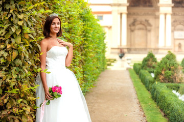 Charming bride in Wallenstein garden in Prague, Czech Republic