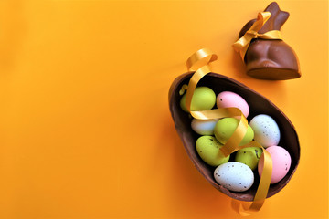  Colored chocolate Easter eggs and chocolate bunny