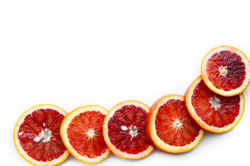 Orange red sweet ripe juicy sliced on a white background. Tropical fruit. Сopy space.Flat lay, top view.