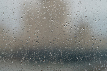 Water drops on the window glass. Macro image of water texture on clear glass
