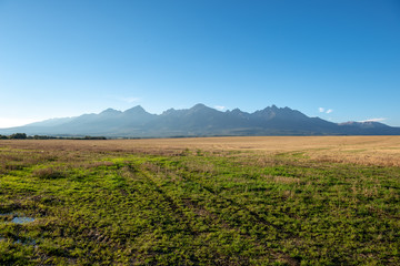 cloudy and foggy sunrise over slovakian landscape in autumn