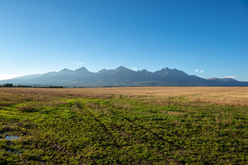 cloudy and foggy sunrise over slovakian landscape in autumn