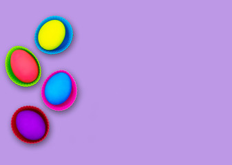 Easter eggs isolated on purple background
