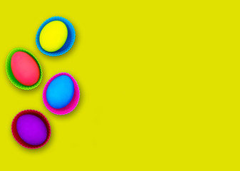 Easter eggs isolated on yellow background
