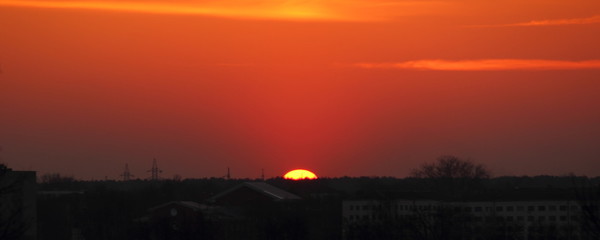 Panoramic beautiful sunset on the outskirts of the city