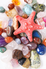 Starfish and colored natural stones 
