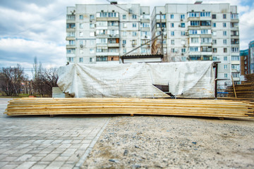 Wooden planks. Beams. Air-drying timber stack. Wood air drying (seasoning lumber or wood seasoning). Timber. Lumber.