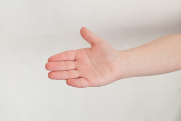 Childs hand isolated on a white background