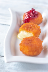 Camembert nuggets with cranberry sauce