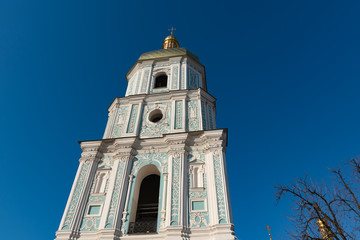 Fototapeta na wymiar Bell tower of Sophia of Kiev, which is a monument of Ukrainian architecture in the, Kiev, Ukraine