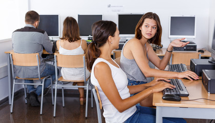 Fototapeta na wymiar Female students studying in computer class