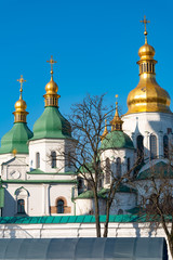 Fototapeta na wymiar Green And Golden Domes Of St. Sophia's Cathedral In Kiev, Ukraine