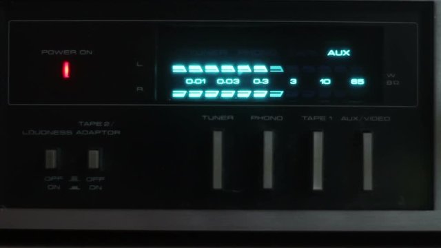 Display of DJ mixing console. Sound impulses show a diagram of sound peaks. Observation of high-quality sound