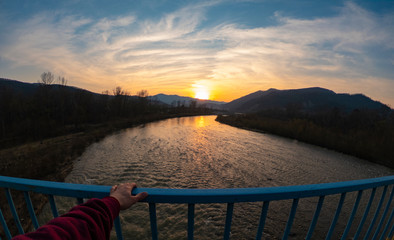 sunset over the river view from the bridge