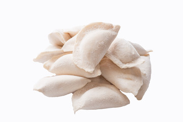 heap of frozen dumplings on a white background. Isolated Dumplings
