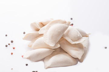 heap of frozen dumplings on a white background. Isolated Dumplings