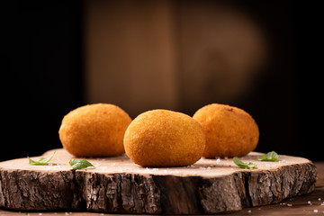 Arancini di riso, fried risotto rice balls, italian sicilian food