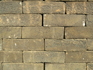 masonry stack of old vintage bricks. abstract brick wall background