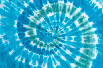 Fototapeta premium Bright Colorful Abstract Psychedelic Tie Dye Swirl Design Pattern.