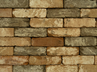 wall of faded vintage bricks. abstract textured background