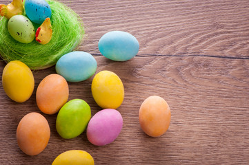 Colorful easter eggs on wood