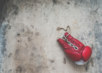 Boxing gloves on a wooden background/toned photo