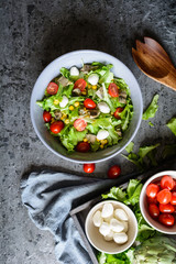 Healthy salad with baked artichoke, Mozzarella, tomatoes and corn