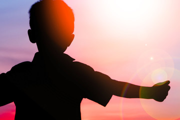 Happy children playing on nature summer silhouette