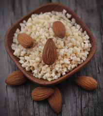 Small pieces of chopped almonds with whole ones