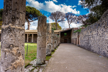 Fototapeta na wymiar Historical ruined buildingsof ancient theatre Roman Imperial city Pompeii