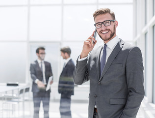 handsome businessman talking on mobile phone