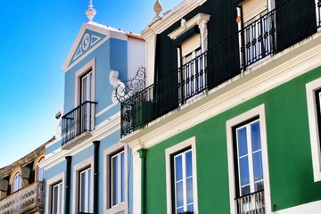 Fototapeta na wymiar Narrow and colorful streets, facades and balconies of Lisbon