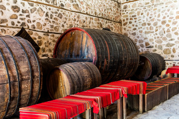 Traditional Wine Cellar with Huge Wine Barrels in the Historic City of Melnik, Bulgaria. 