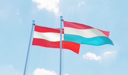 Austria and Luxembourg, two flags waving against blue sky. 3d image