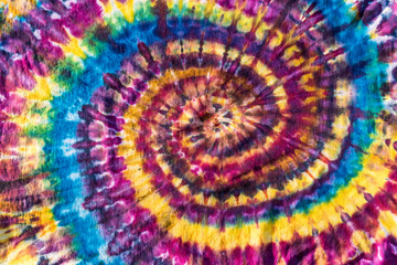 Obraz premium Bright Colorful Abstract Psychedelic Tie Dye Swirl Design Pattern.