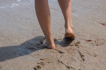 feet on the beach