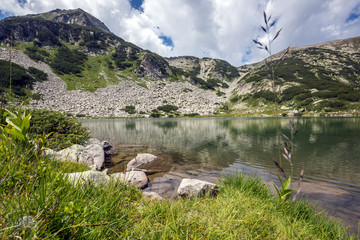 Fototapeta na wymiar Summer landscape of Muratovo (Hvoynato) lake at Pirin Mountain, Bulgaria